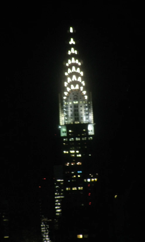 an aerial po of the buliding in a city at night