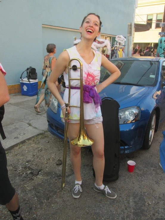 a woman posing for a po with her instrument