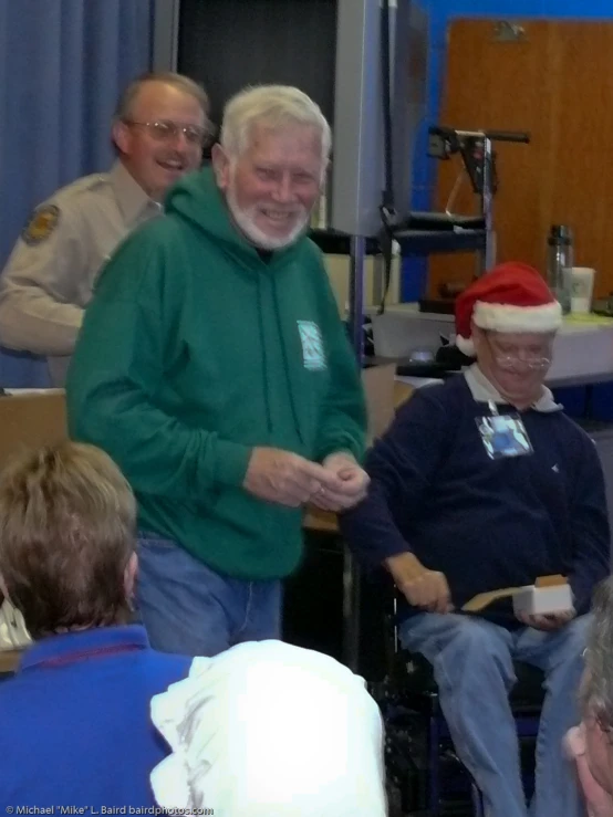 three men dressed up at an event in a room