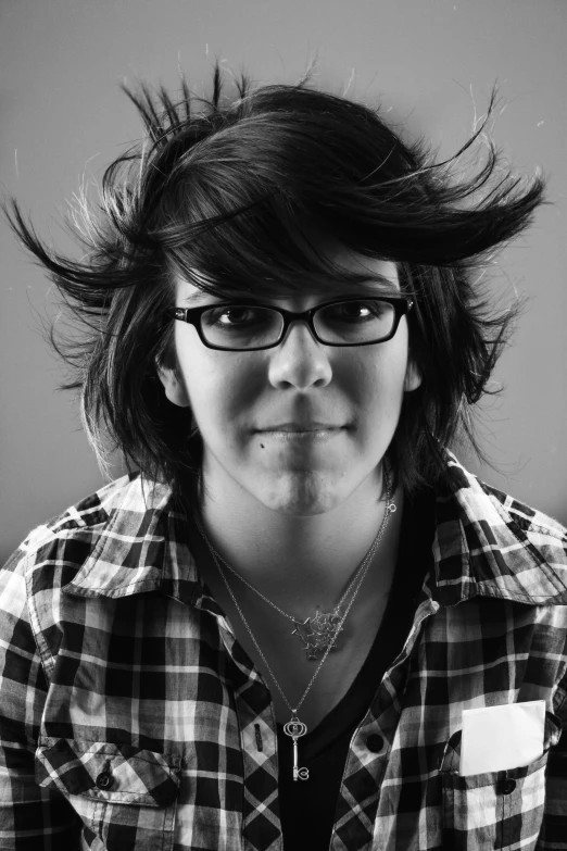 black and white pograph of a woman wearing glasses