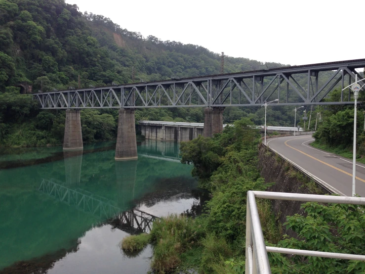 a bridge over water going under it