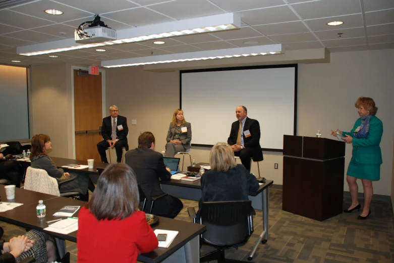 an image of people in a room that is speaking