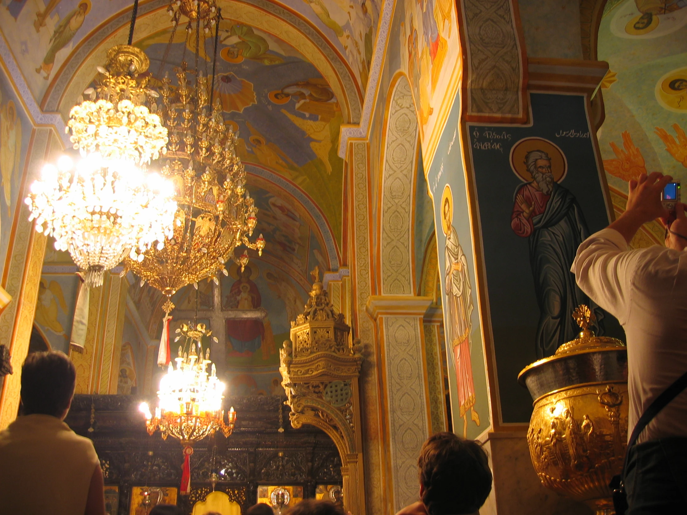 the interior of a large church has many decorations