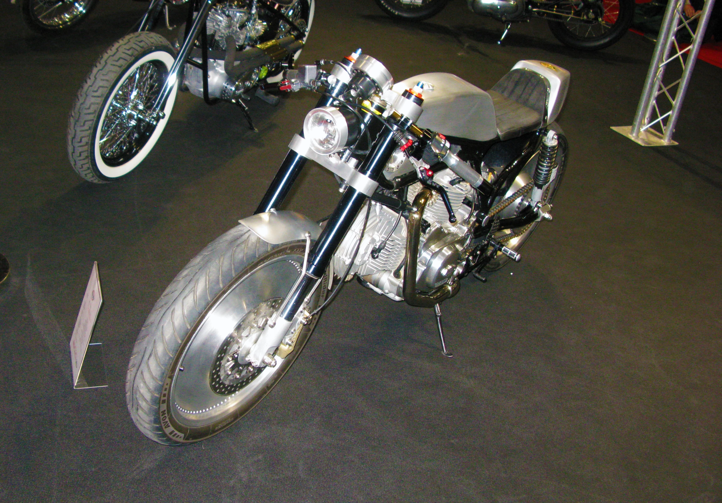 a motor cycle that is parked in a show room