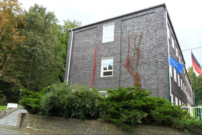 a building with flags painted on the side