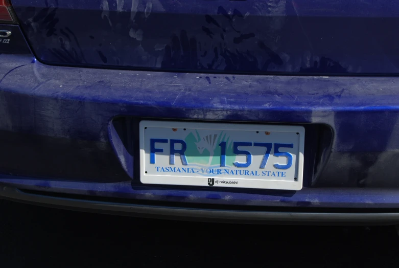 a license plate on the back of a car