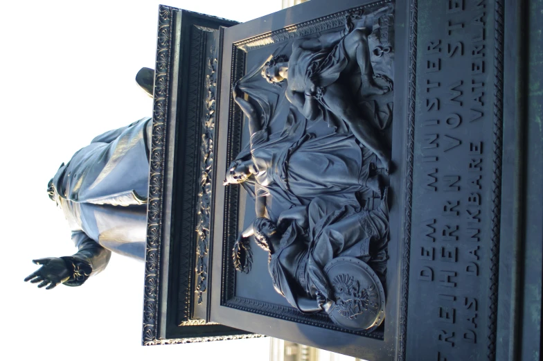 an ornate statue with a lady on her lap