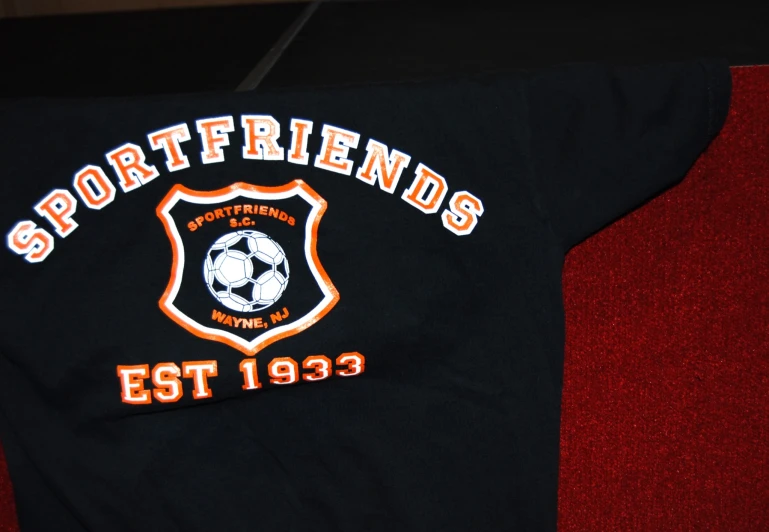 the embroidered logo is for a soccer team