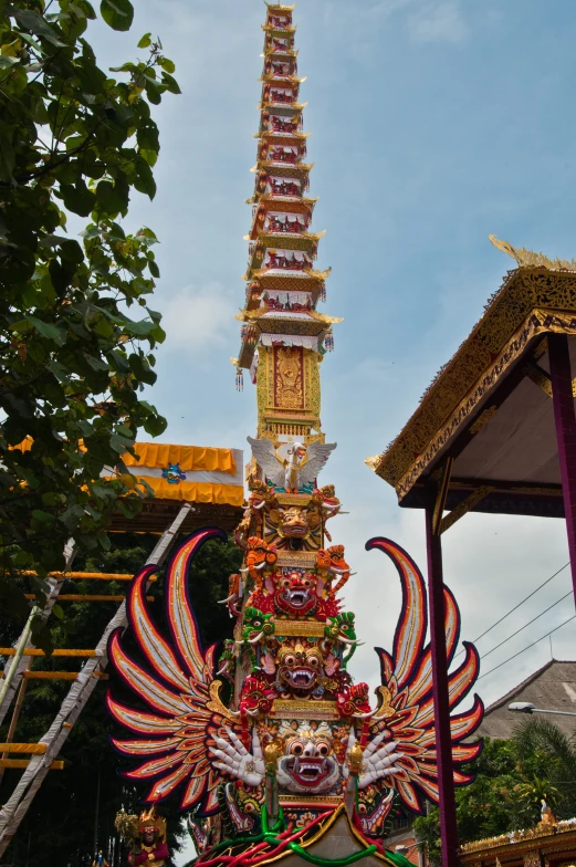 a colorful float is displayed on a cloudy day