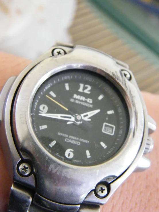 a close - up s of a person's wristwatch