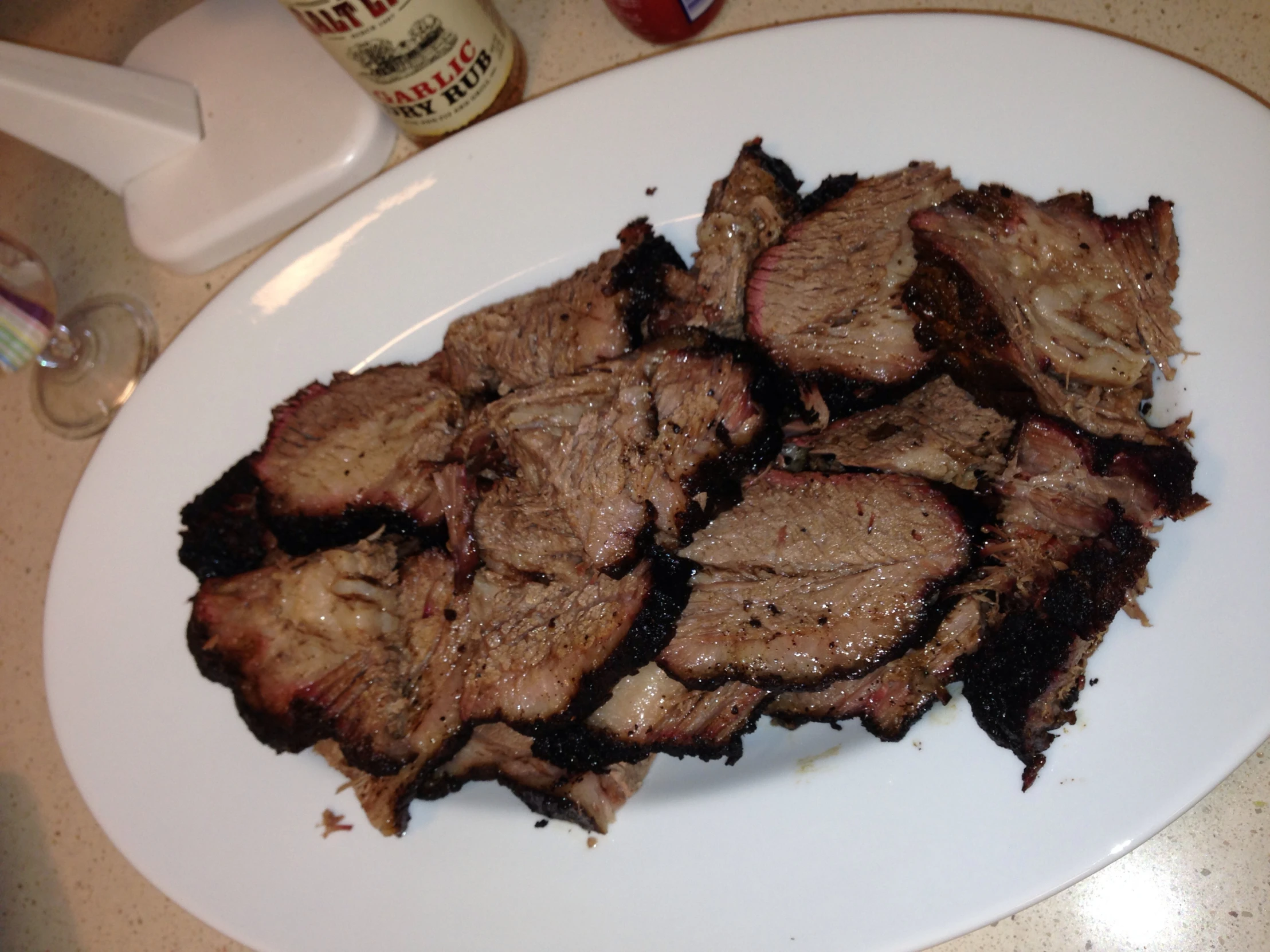 close up of sliced beef on a white plate