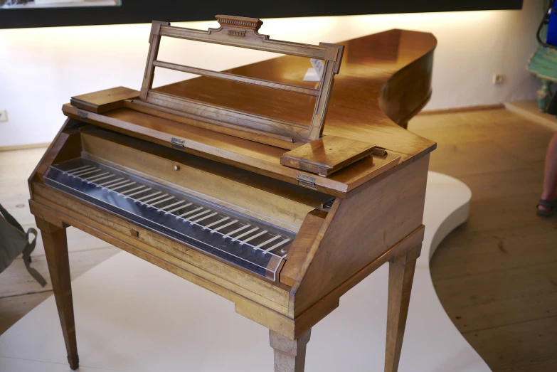 the piano is made up of wood and metal