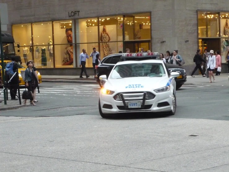 a police car that is parked on a street