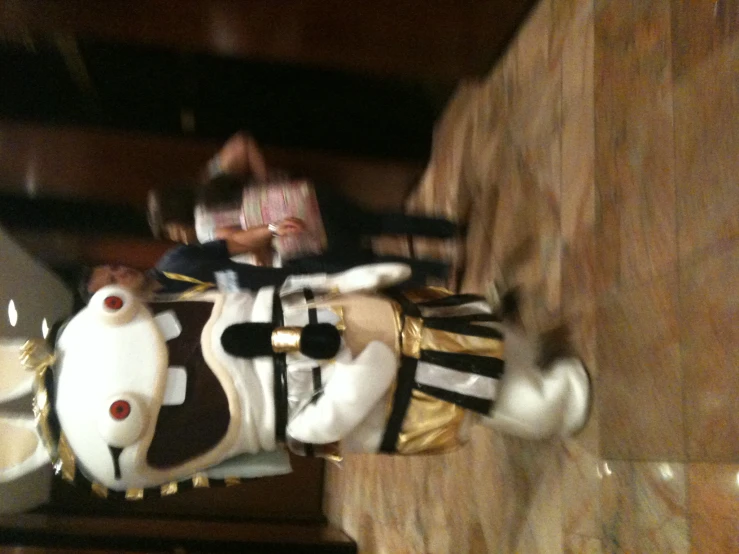 a costume made to look like an robot with horns and feet