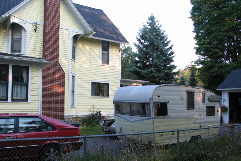 a large truck parked in front of a house