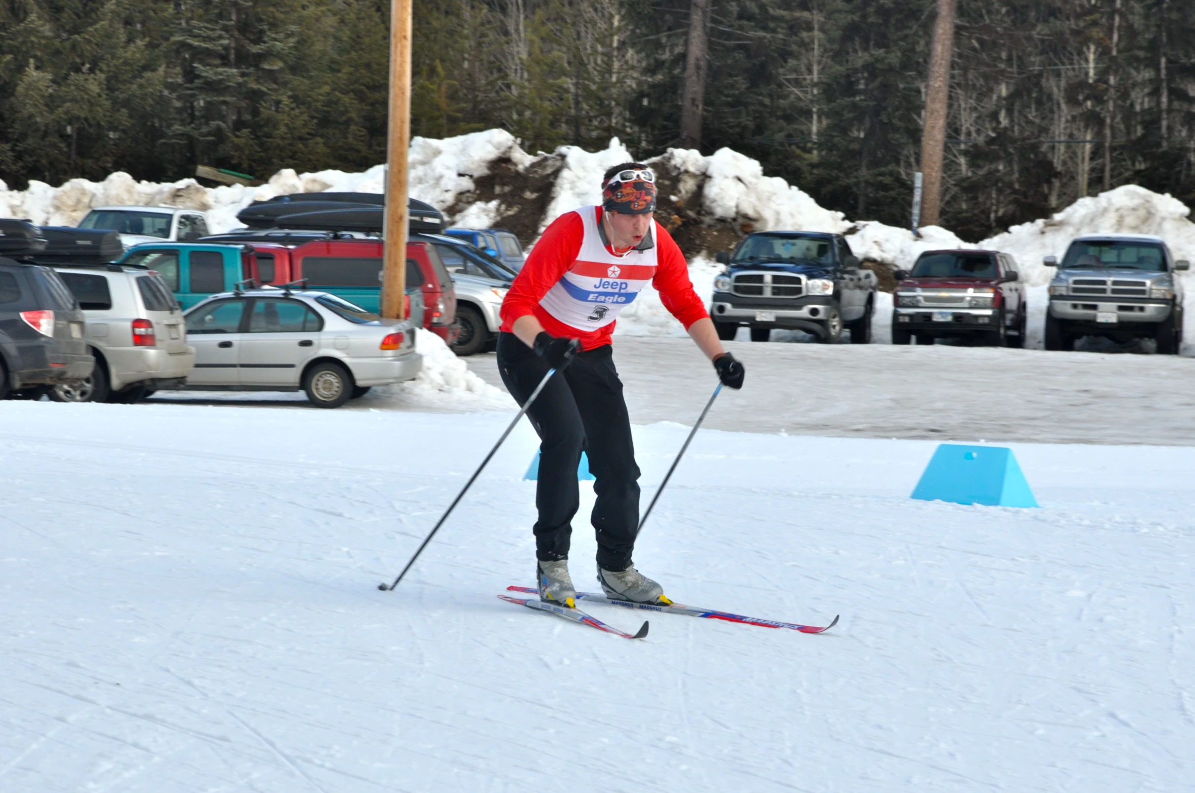 there is a man riding skis on a snowy hill