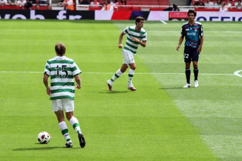 soccer players are on the field playing a game