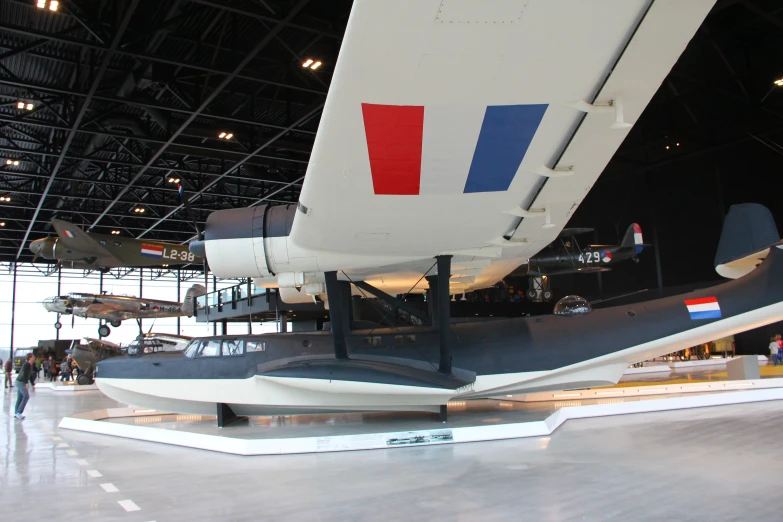 the inside of a plane museum with many different planes