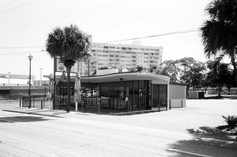 a small business in an industrial area with some trees