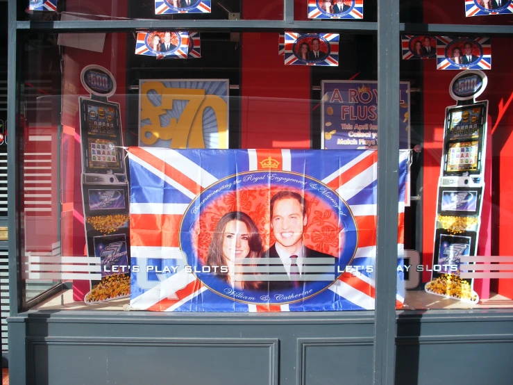 this is a british flag window with a picture of two people on it