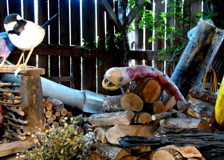 several wood statues stacked up on top of each other