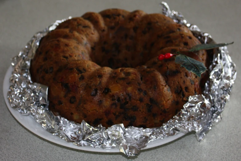 a chocolate chip bundt cake sitting on tin foil