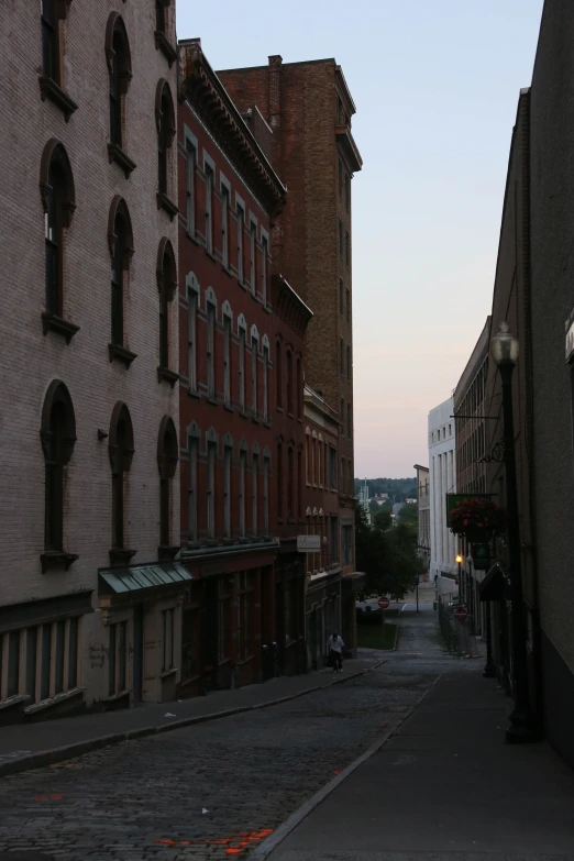 the sidewalk and street are very quiet from sun down