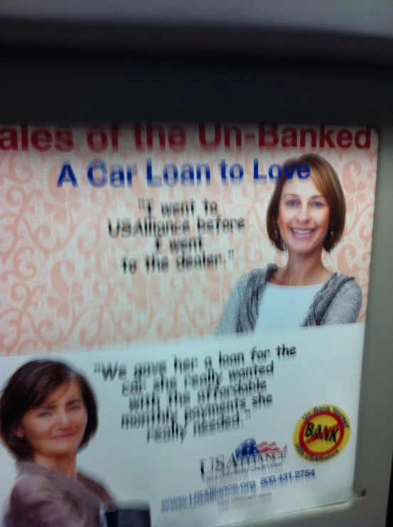 a large poster advertises a bank for the return of bank account