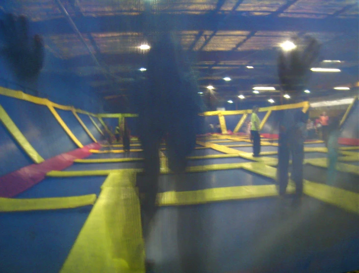 a person is walking along a trampoline