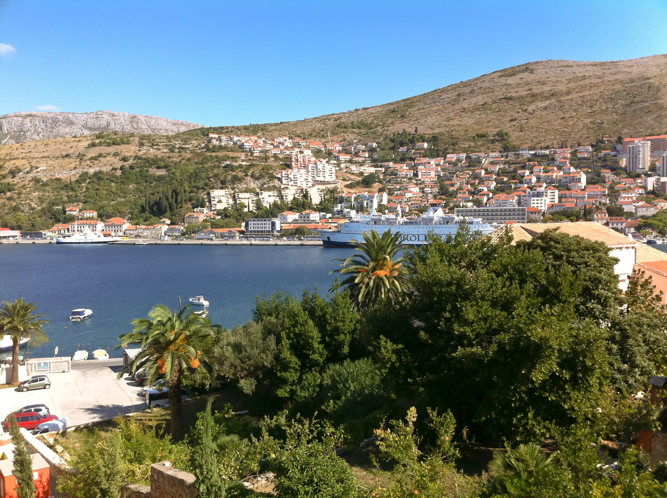 the view of a harbor that is full of boats