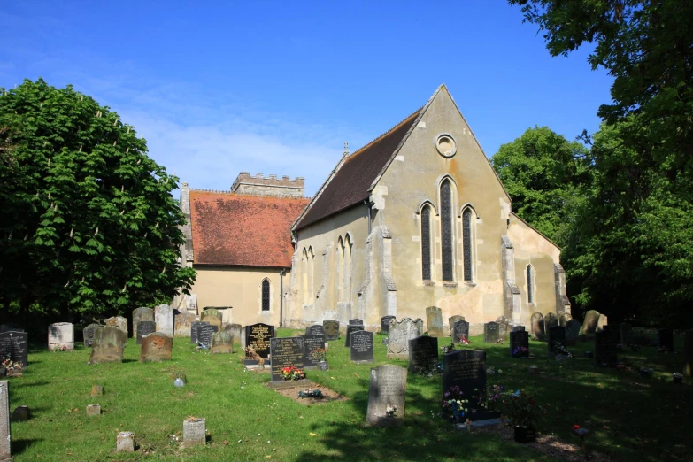 a church with some graves in front of it