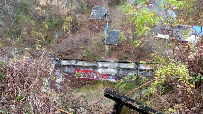 the old railway has graffiti painted on it