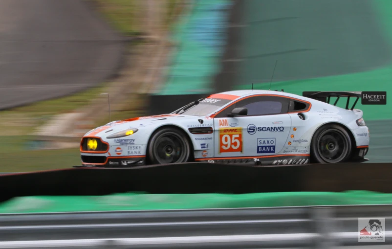 a race car driving on a track with no cars