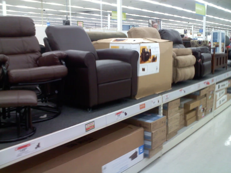 a bunch of couches in the middle of a display