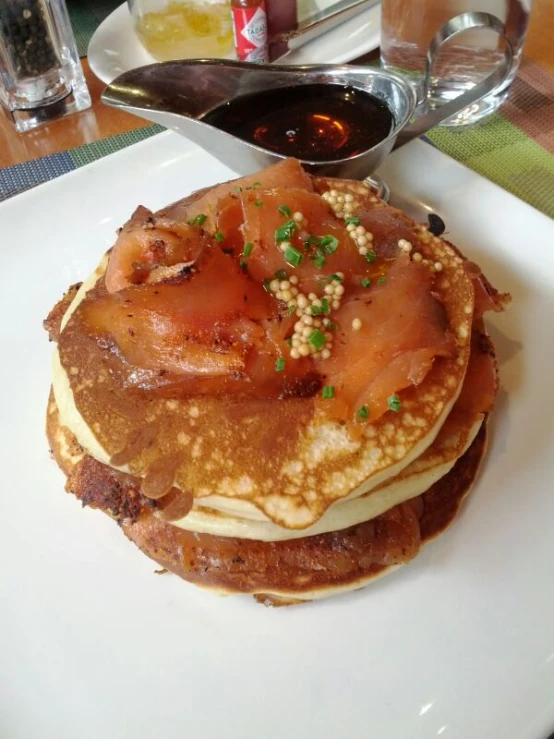 a plate with some pancakes on top of it