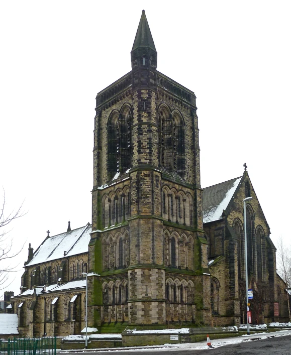 old church in the snow surrounded by tall windows