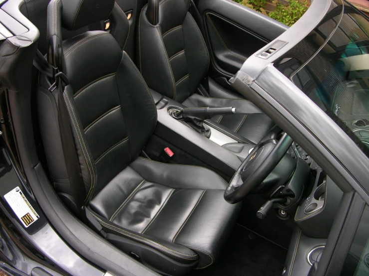 an interior s of a black car with black seats