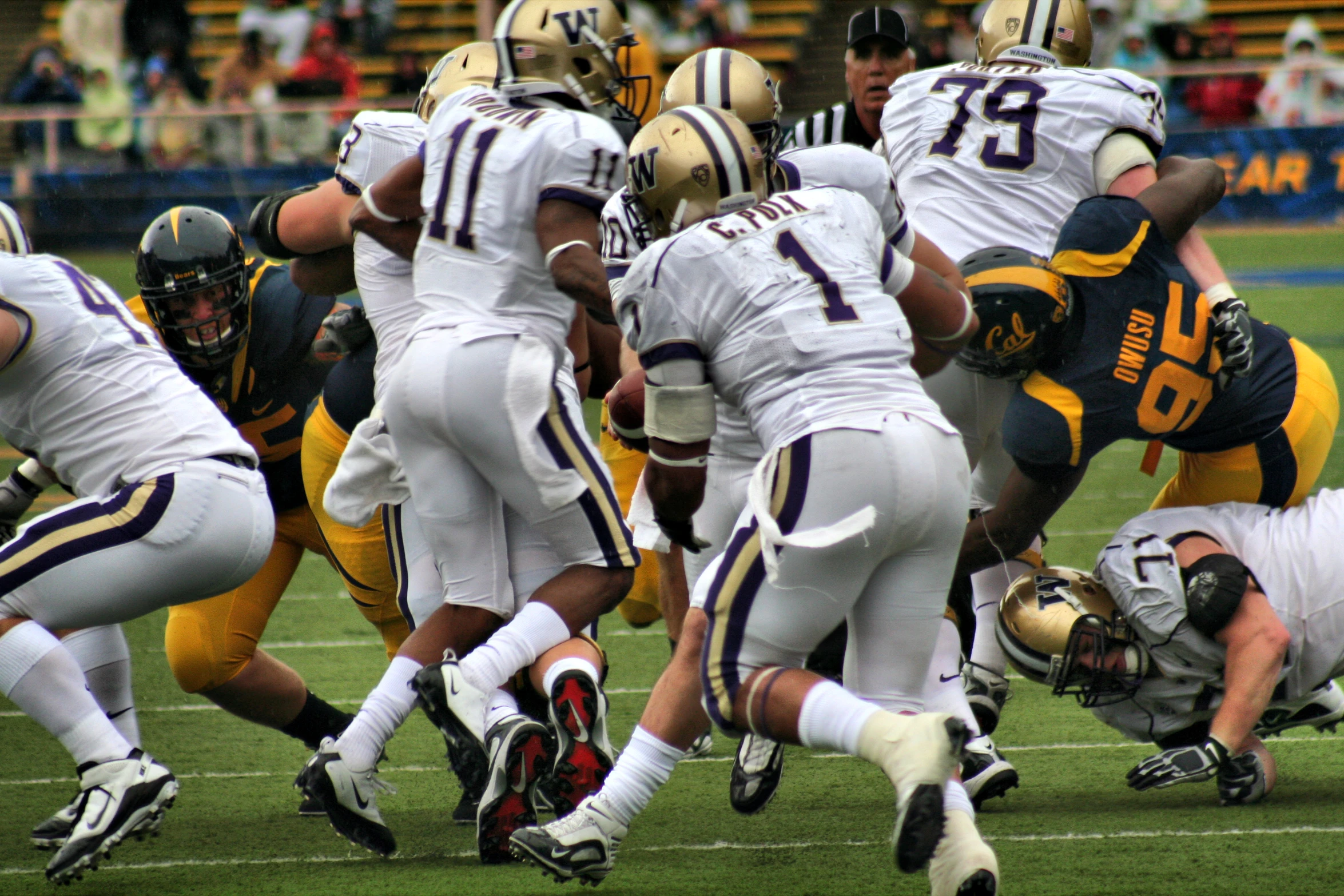 a group of football players is playing football