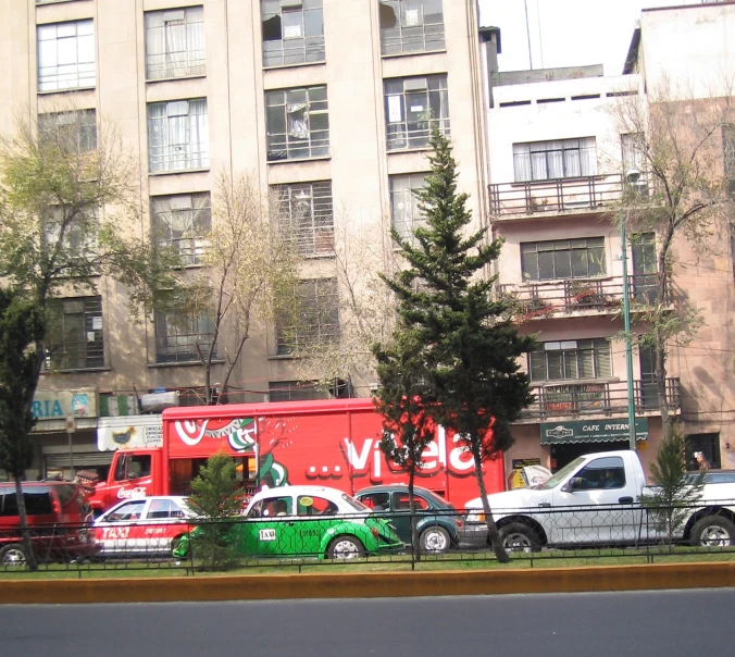 a large truck is parked outside of a building