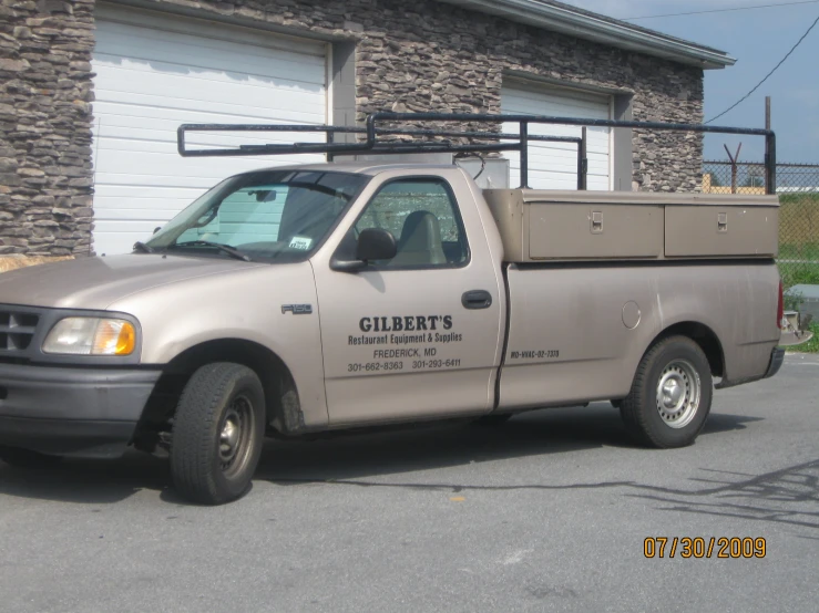 a truck that is parked outside of a house