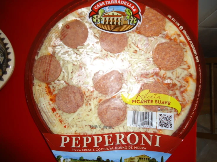 a pepperoni pizza with a red background