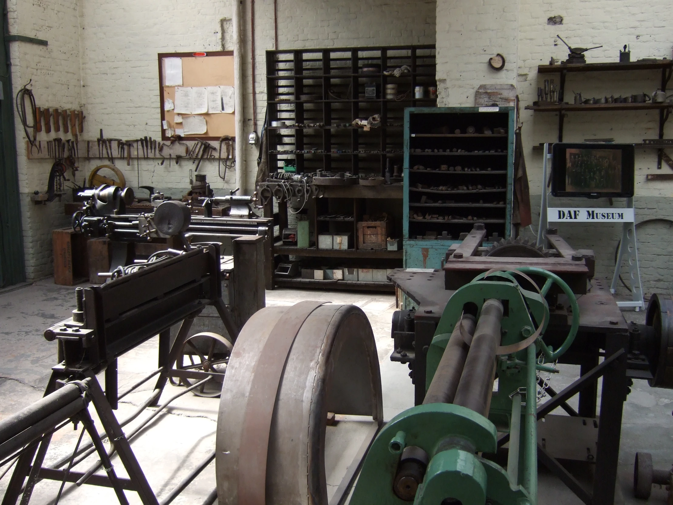 a warehouse full of various metal and wood machines