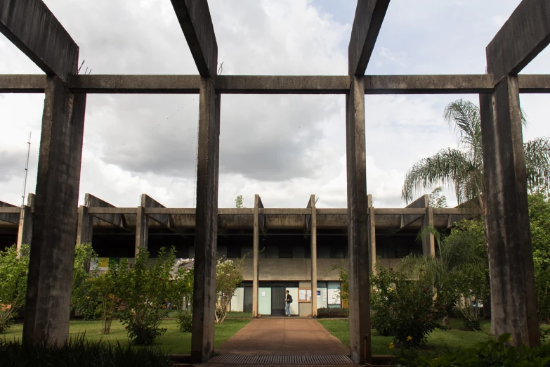 the inside of a building is seen through two large windows