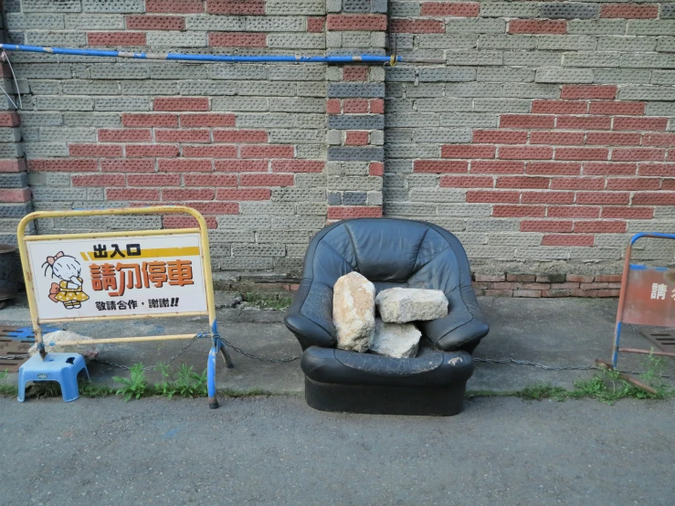 two chairs sitting next to each other near a wall