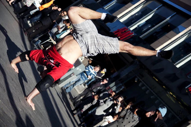 a man flying through the air while riding a skateboard