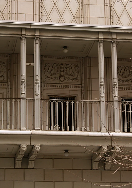 ornate white balconies and balcony railings on old building