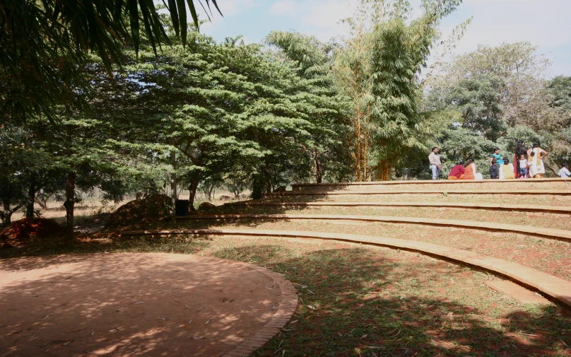 people standing in the distance of a set of stone stairs