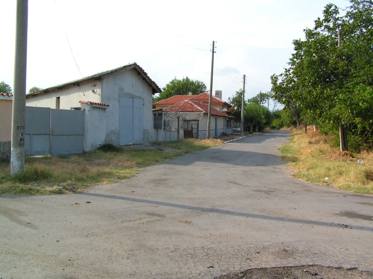 an empty street with a very old building