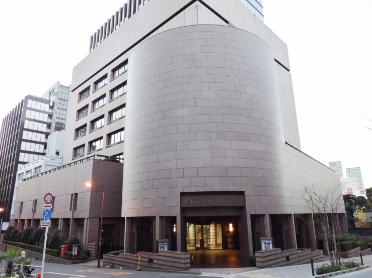 this is a large, round building with an entrance and several windows