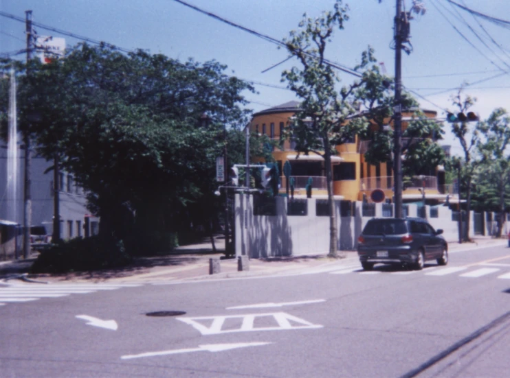 a car is parked on the side of the road